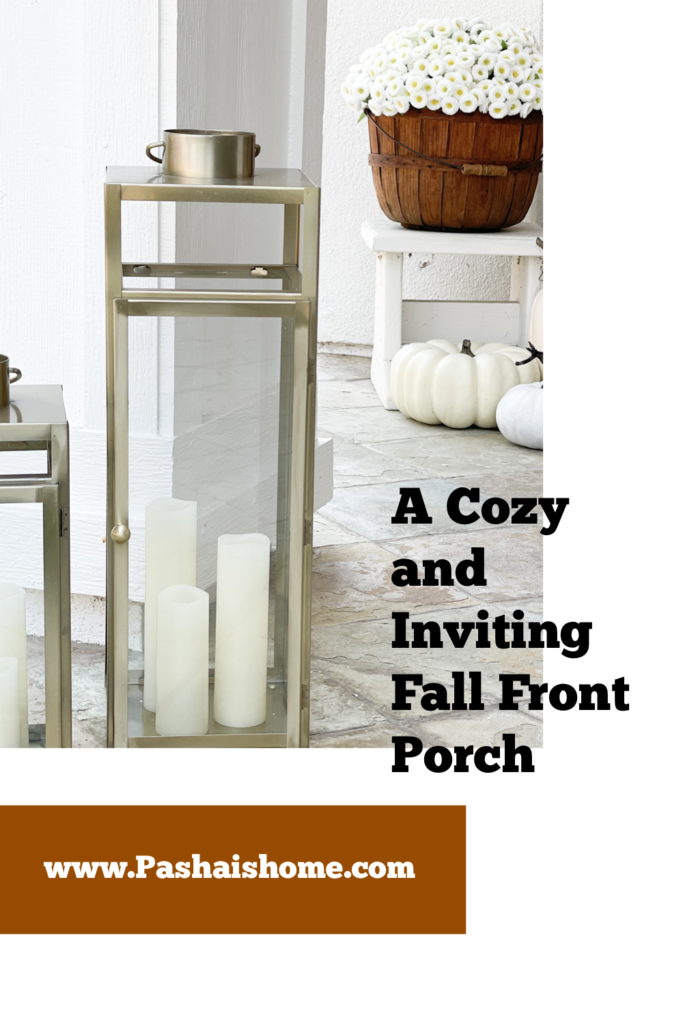 A welcoming fall porch with tips on how to make your front porch cozy and inviting using fall pillows, garlands, throws, and signs.