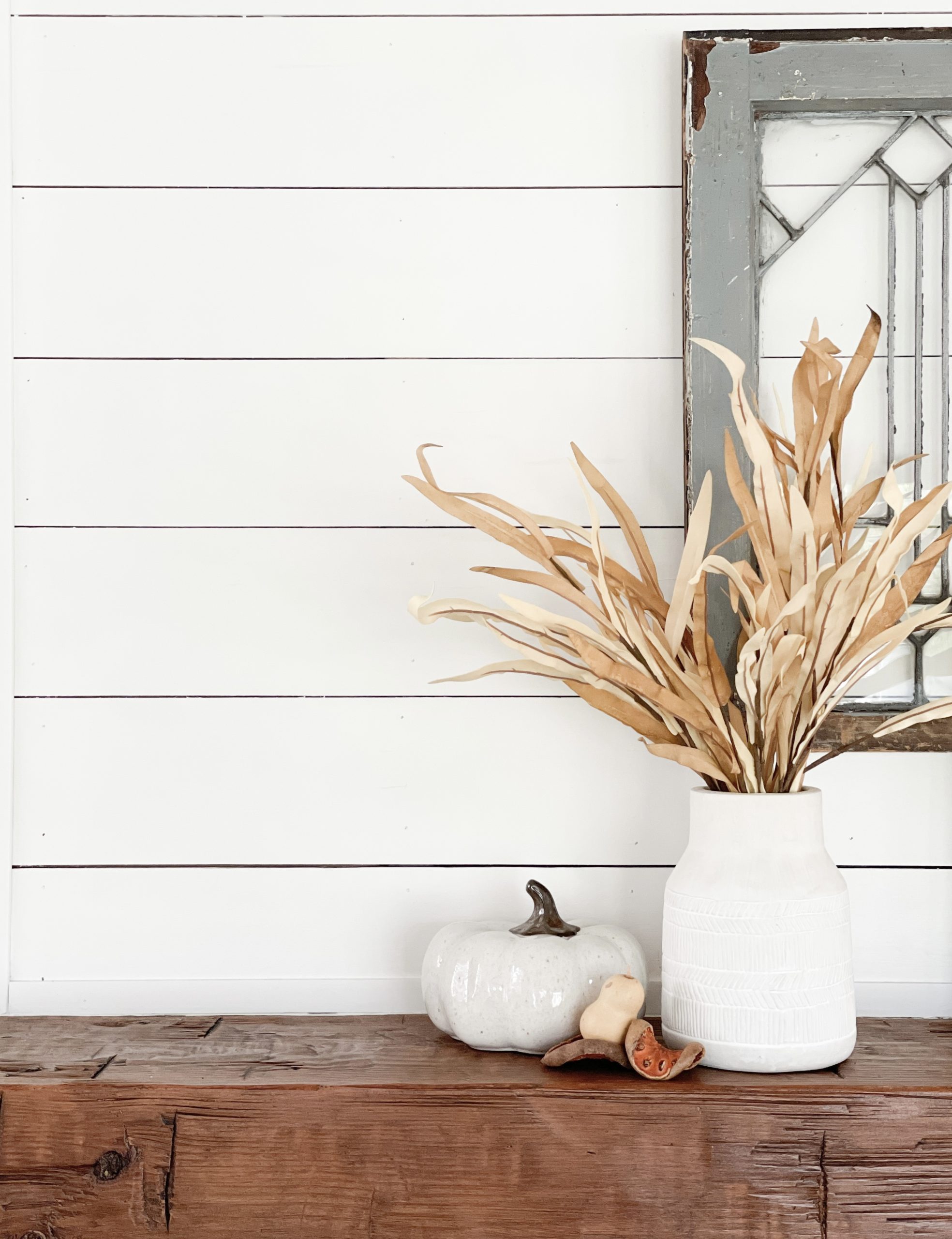 fallify your fireplace mantel fall fireplace mantel ideas with candlesticks and wheat sheaths sherwin williams accessible beige paint color shiplap walls
