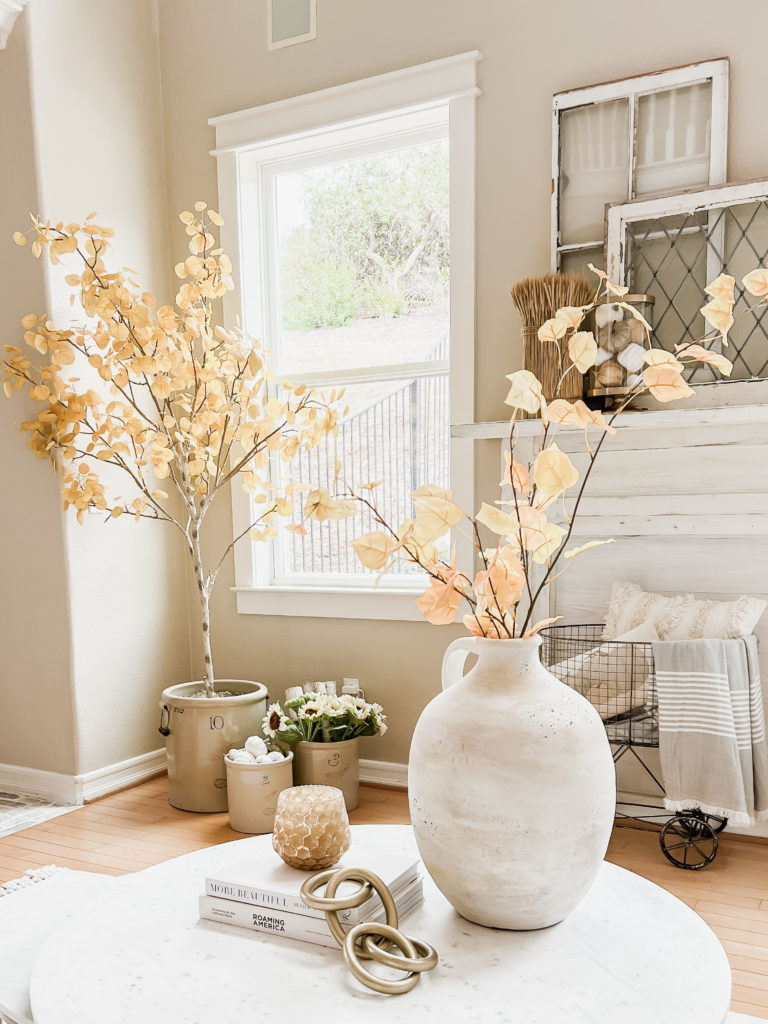 Come on in and tour my cozy fall home for inspiration on how to have a seasonally decorated fall home with pumpkins, wreaths, wheat sheaves, and more! All fun items for a cozy fall home.  Paint colors are Sherwin Williams Accessible Beige and Frazee White Shadow and Sherwin Williams Pure White 
#falldecorideasforthehome #decor #fallaesthetic 