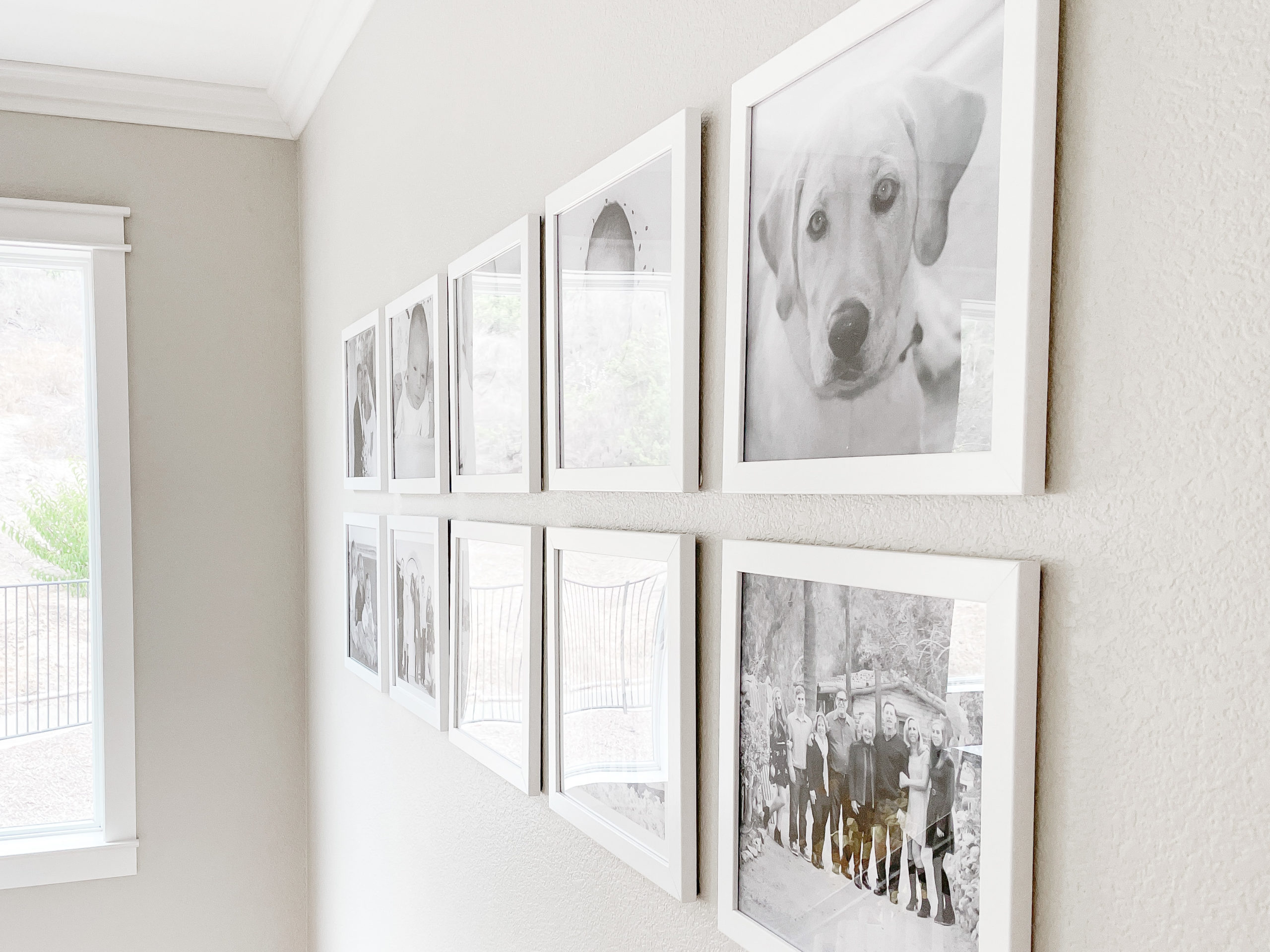 Eight simple steps on how to make a gallery wall - Sherwin Williams paint color Accessible Beige