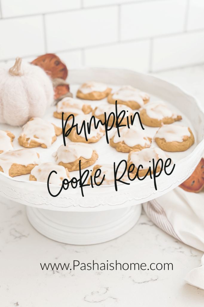 Pumpkin Cookie recipe that will surely be a fall favorite as they are a pumpkin cookie on a pretty white cake stand.  Wall color is Sherwin Williams Accessible Beige.  Perimeter countertops are white quartz and island is soapstone.  Backsplash is white subway tile with gray grout.
