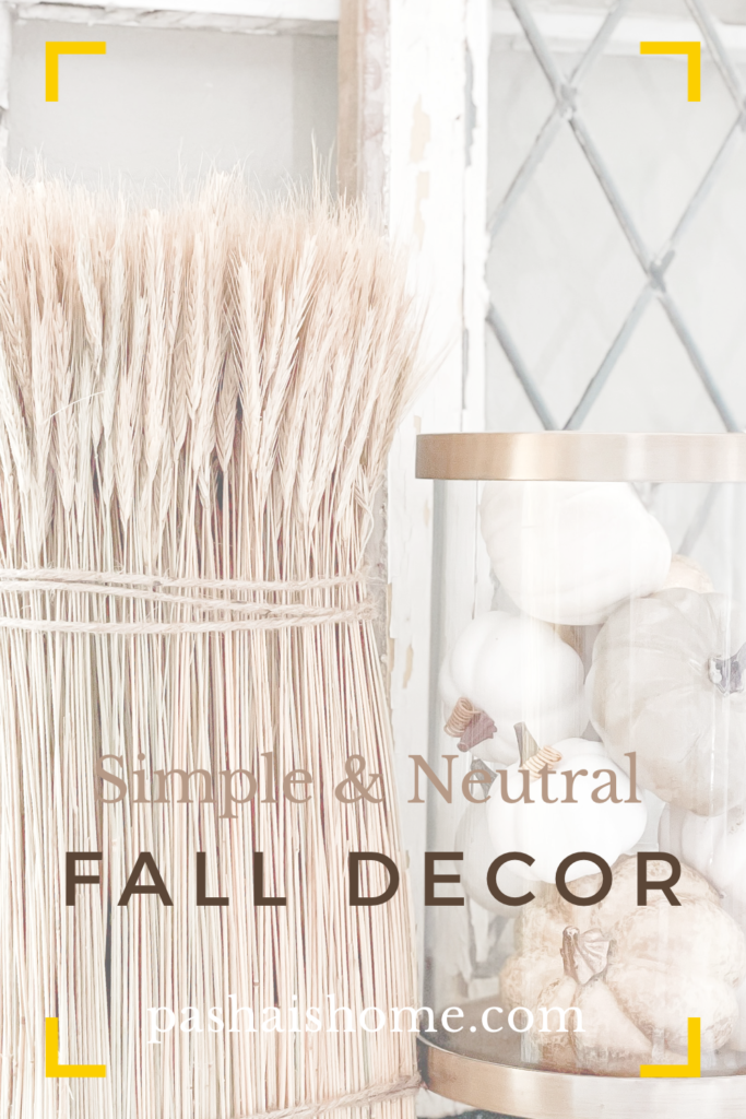 simple and neutral fall decor ideas using faux apples and pumpkins, orange slices, and wooden accessories sherwin williams accessible beige on walls