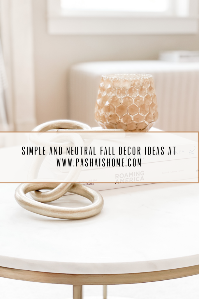 simple and neutral fall decor ideas using faux apples and pumpkins, orange slices, and wooden accessories sherwin williams accessible beige on walls
