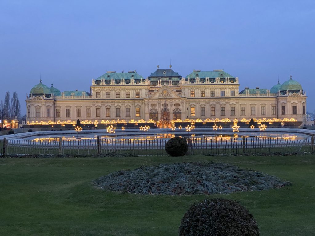 A Festive Travel Guide to Vienna at Christmas including where to stay in Vienna, where to eat in Vienna, and top things to do in Vienna.  You can also find a list of all the don't miss Vienna Christmas markets.  Our full itinerary included three days in Vienna with three days in Budapest, Hungary afterwards!  Photo is of Belvedere Palace.

#europeanchristmasmarkets #europeantravel #viennachristmasmarket #viennachristmas #christmasinvienna