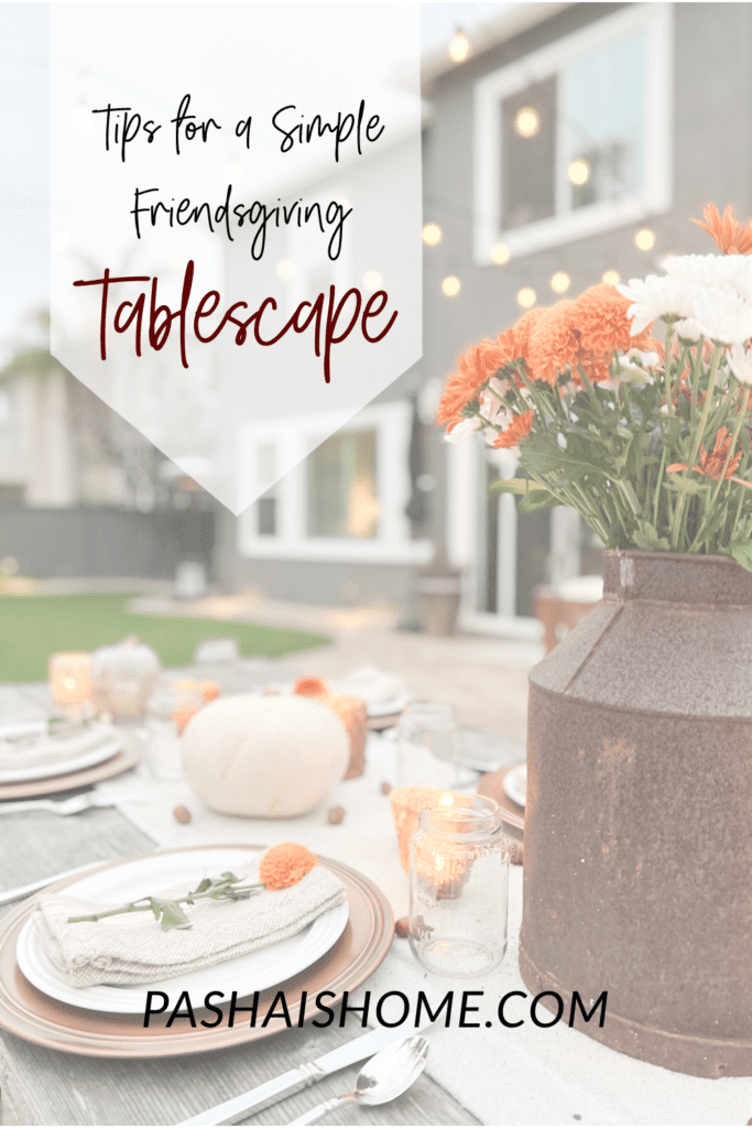 Ideas for a simple and welcoming Friendsgiving Tablescape using vintage decor, pumpkins, flowers, candles, and acorns.  Can also be Thanksgiving tablescape ideas - especially an outdoor celebration!

#falldecor #thanksgiving #friendsgiving #Thanksgivingtable #Friendsgivingtableideas