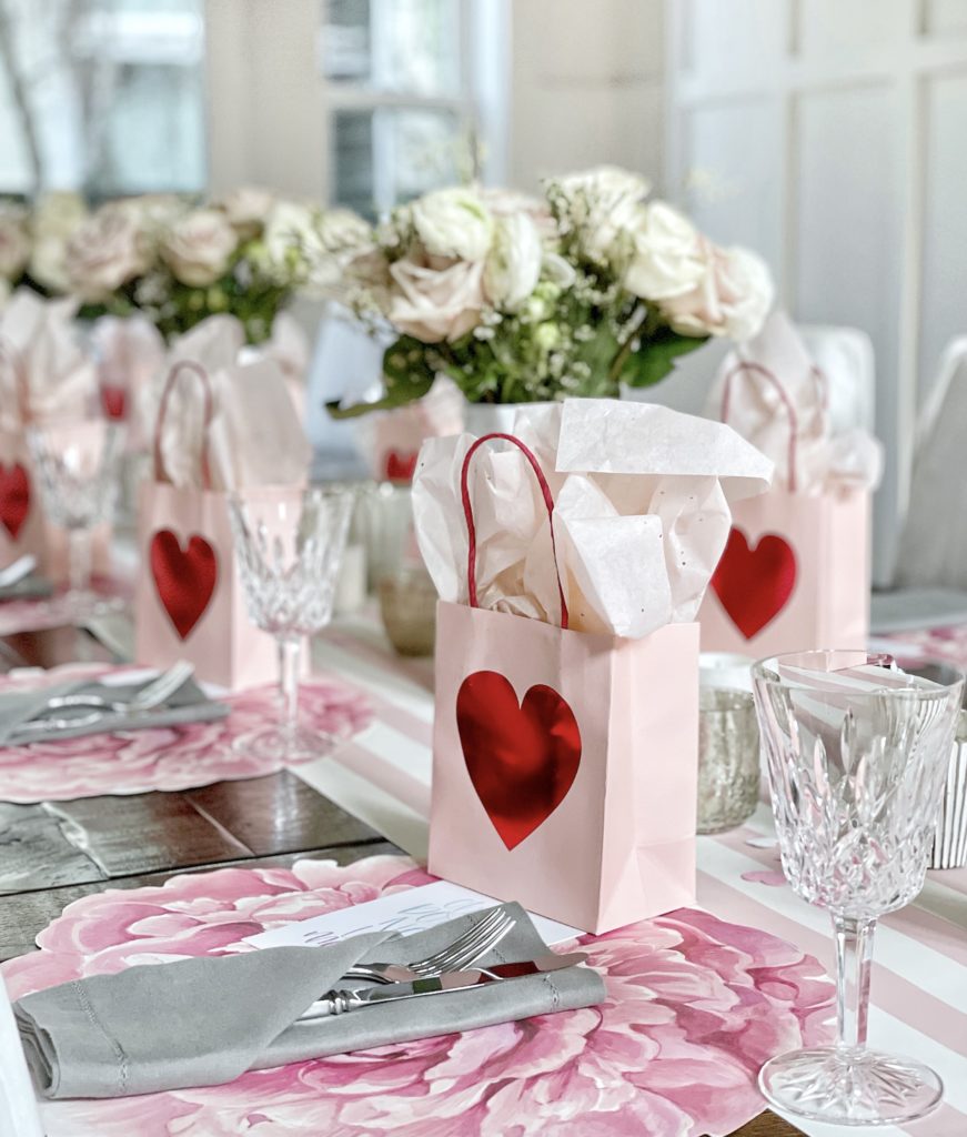 Tips for hosting a Galentine's Day favorite things party | What to do at a Galentine's Day party | What food to serve at a Galentine's Day party | How to decorate for a Galentine's Day party | A Galentines Day Party photo backdrop | Combining a Galentine's Day party with a favorite things party | How to host a Favorite things party | What is a Favorite things party | What is Galentines Day? 