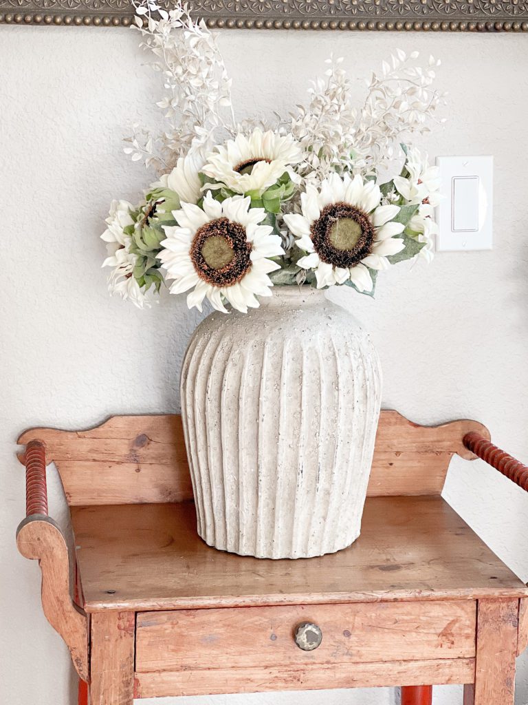 Simple Fall decorating ideas to get excited about with white sunflowers in a white vase
