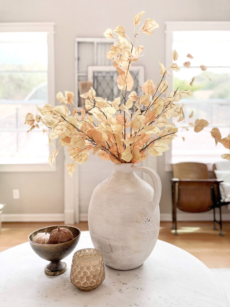 Simple Fall decorating ideas to get excited about with a large urn vase and yellow aspen leaf faux stems