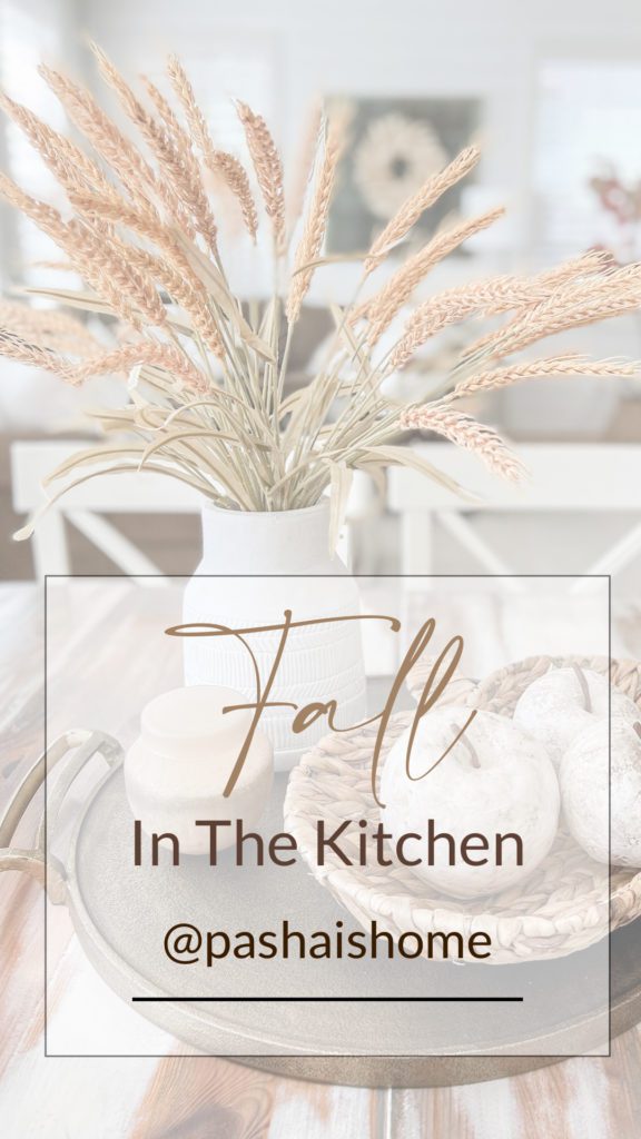 Easy ways to add fall decor to the kitchen | Fall decor inspiration | Fall decor in the kitchen | Kitchen decorating ideas for fall | Fall decor on open shelves in a kitchen | Faux pumpkins and vintage copper for fall decor | Gold faucet and glass soap bottles for fall decorations | Fall dish towels 