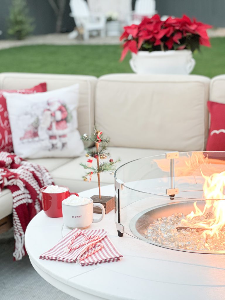 How to decorate your outdoor spaces for Christmas | Outdoor holiday decor | Holiday decor outside | Backyard decorations | Backyard holiday decor | Firepit sitting | Christmas front porch | Christmas decor | Holiday front porch decor | Decorated holiday spaces 