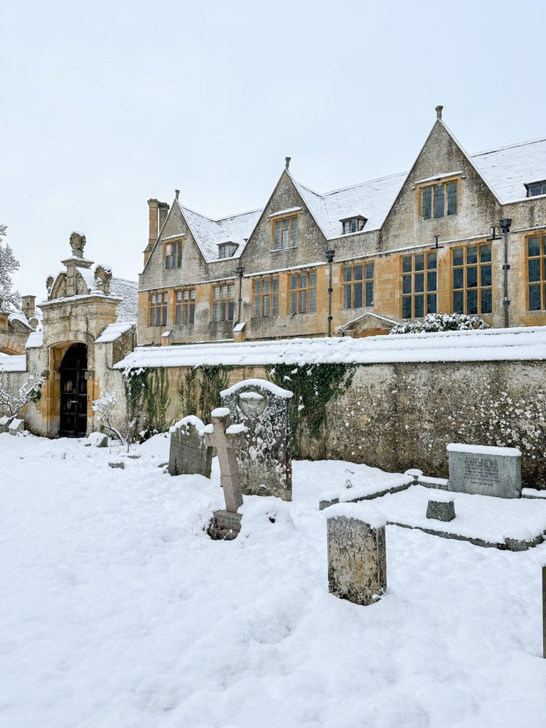 The Cotswolds winter travel guide | Winter in the Cotswolds | How to spend two days in the Cotswolds | Travel Guide to the Cotswolds without a car | Where to stay in the Cotswolds without a car | Where to eat in the Cotswolds | What villages in the Cotswolds to visit | Snow covered Cotswolds buildings | Winter in the Cotswolds | Visiting the Cotswolds | Broadway High Street