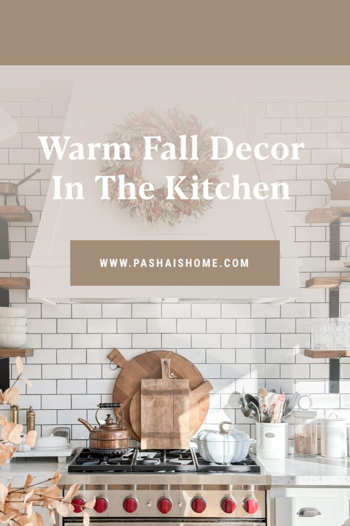 How to use warm fall decor in the kitchen | Fall home tour | Fall kitchen ideas | Kitchen decor for fall | Seasonal decor in the kitchen | Fall appetizer plates and salt and pepper shakers as decor | faux fall stems in the kitchen | Kitchen island fall decor | Decorating open shelves in the kitchen for fall | Fall wreath on the kitchen hood 