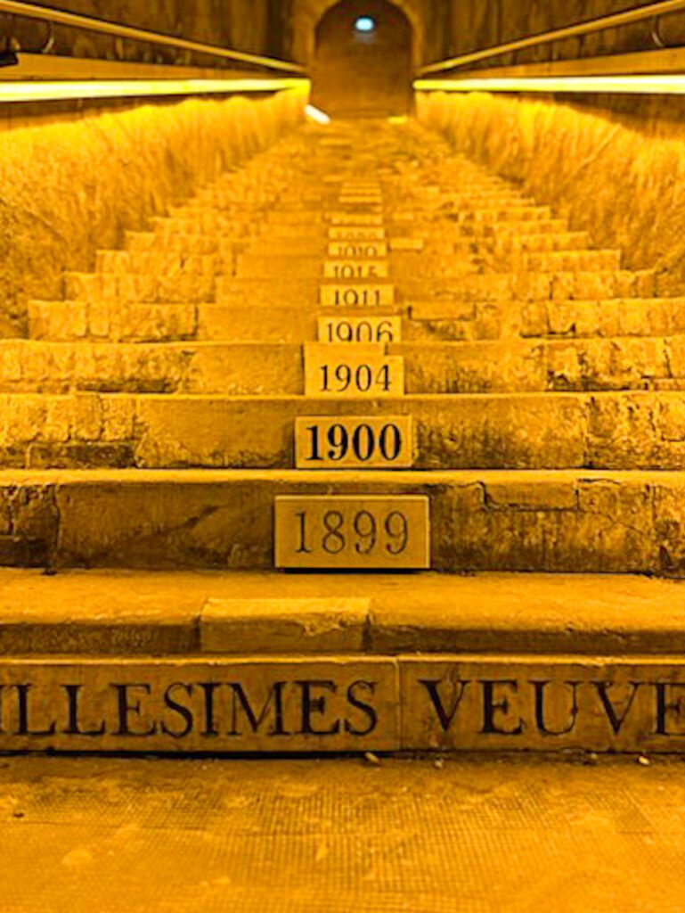 How to visit the Veuve Clicquot champagne house in Reims France | A travel guide for Reims France | Day trip from Paris to Champagne valley | Tips for a day trip to Veuve Clicquot champagne house in France | French destinations near Paris | What to see in Reims France | How to get to the Veuve Clicquot champagne house tour | Which tour to do at Veuve Clicquot 