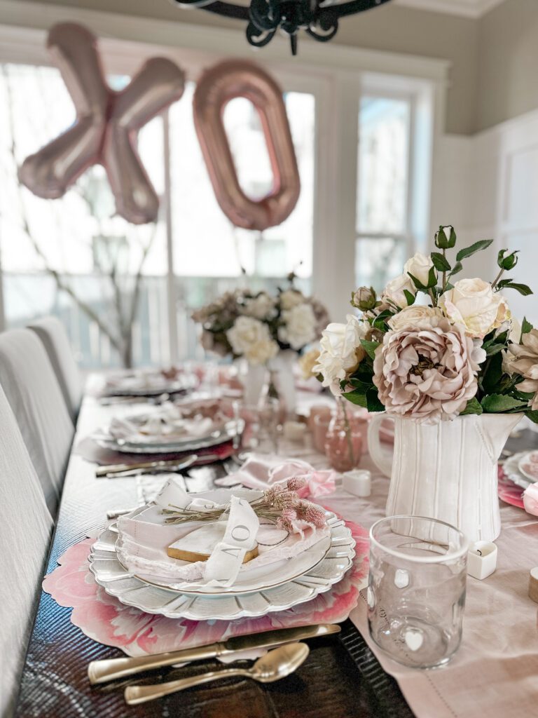 Tips for hosting a Galentine's Day favorite things party | What to do at a Galentine's Day party | What food to serve at a Galentine's Day party | How to decorate for a Galentine's Day party | A Galentines Day Party photo backdrop | Combining a Galentine's Day party with a favorite things party | How to host a Favorite things party | What is a Favorite things party | What is Galentines Day? 