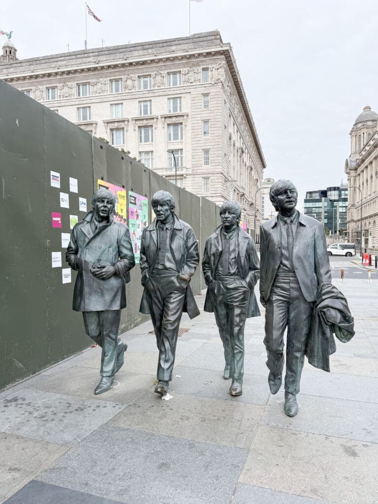 The Ultimate Liverpool England Travel Guide | What to do in Liverpool England | Best hotels in Liverpool England | 5 star hotels in Liverpool | Top things to do in Liverpool England | Best Beatles sights in Liverpool | Best private Beatles tour in Liverpool | The Cavern Club during International Beatles Week in August |  should you do a private beatles tour in Liverpool |  Fab 4 Taxi Tour for Beatles sights in Liverpool |  Penny Lane in Liverpool |  John Lennon Imagine statue in Liverpool |  Strawberry Field in Liverpool |  John Lennon's childhood home |  Eleanor Rigby's gravestone |  Where did John Lennon and Paul McCartney meet?  |  Paul McCartney's Childhood home |  Liverpool Cathedral |  The Georgian Quarter in Liverpool |  