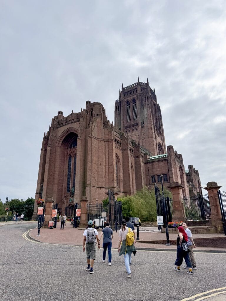 The Ultimate Liverpool England Travel Guide | What to do in Liverpool England | Best hotels in Liverpool England | 5 star hotels in Liverpool | Top things to do in Liverpool England | Best Beatles sights in Liverpool | Best private Beatles tour in Liverpool | The Cavern Club during International Beatles Week in August |  should you do a private beatles tour in Liverpool |  Fab 4 Taxi Tour for Beatles sights in Liverpool |  Penny Lane in Liverpool |  John Lennon Imagine statue in Liverpool |  Strawberry Field in Liverpool |  John Lennon's childhood home |  Eleanor Rigby's gravestone |  Where did John Lennon and Paul McCartney meet?  |  Paul McCartney's Childhood home |  Liverpool Cathedral |  