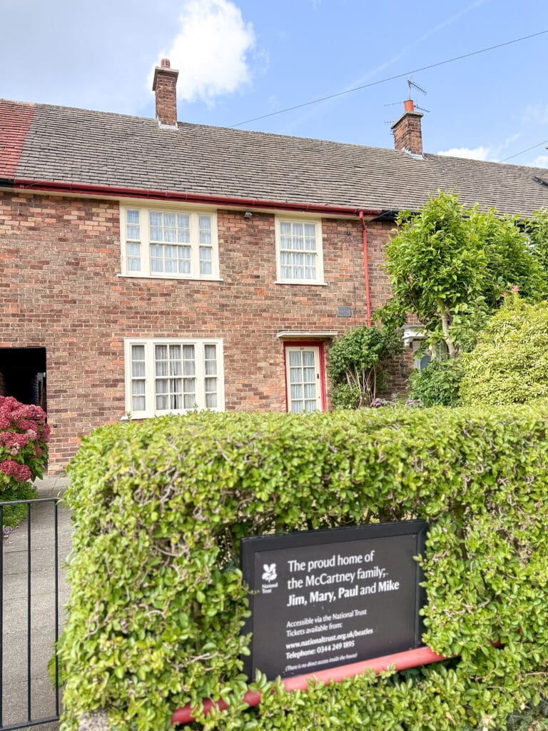 The Ultimate Liverpool England Travel Guide | What to do in Liverpool England | Best hotels in Liverpool England | 5 star hotels in Liverpool | Top things to do in Liverpool England | Best Beatles sights in Liverpool | Best private Beatles tour in Liverpool | The Cavern Club during International Beatles Week in August |  should you do a private beatles tour in Liverpool |  Fab 4 Taxi Tour for Beatles sights in Liverpool |  Penny Lane in Liverpool |  John Lennon Imagine statue in Liverpool |  Strawberry Field in Liverpool |  John Lennon's childhood home |  Eleanor Rigby's gravestone |  Where did John Lennon and Paul McCartney meet?  |  Paul McCartney's Childhood home |  