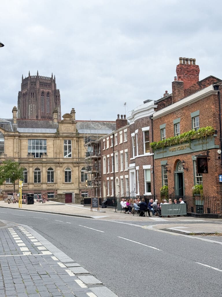 The Ultimate Liverpool England Travel Guide | What to do in Liverpool England | Best hotels in Liverpool England | 5 star hotels in Liverpool | Top things to do in Liverpool England | Best Beatles sights in Liverpool | Best private Beatles tour in Liverpool | The Cavern Club during International Beatles Week in August |  should you do a private beatles tour in Liverpool |  Fab 4 Taxi Tour for Beatles sights in Liverpool |  Penny Lane in Liverpool |  John Lennon Imagine statue in Liverpool |  Strawberry Field in Liverpool |  John Lennon's childhood home |  Eleanor Rigby's gravestone |  Where did John Lennon and Paul McCartney meet?  |  Paul McCartney's Childhood home |  Liverpool Cathedral |  The Georgian Quarter in Liverpool |  