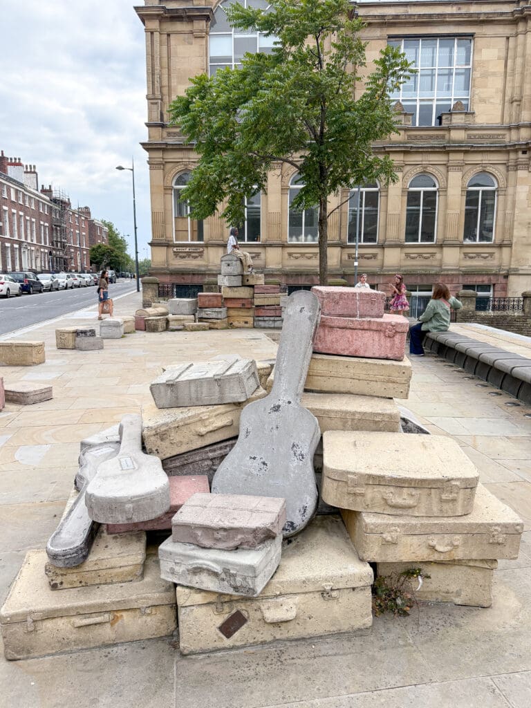 The Ultimate Liverpool England Travel Guide | What to do in Liverpool England | Best hotels in Liverpool England | 5 star hotels in Liverpool | Top things to do in Liverpool England | Best Beatles sights in Liverpool | Best private Beatles tour in Liverpool | The Cavern Club during International Beatles Week in August |  should you do a private beatles tour in Liverpool |  Fab 4 Taxi Tour for Beatles sights in Liverpool |  Penny Lane in Liverpool |  John Lennon Imagine statue in Liverpool |  Strawberry Field in Liverpool |  John Lennon's childhood home |  Eleanor Rigby's gravestone |  Where did John Lennon and Paul McCartney meet?  |  Paul McCartney's Childhood home |  Liverpool Cathedral |  The Georgian Quarter in Liverpool |  