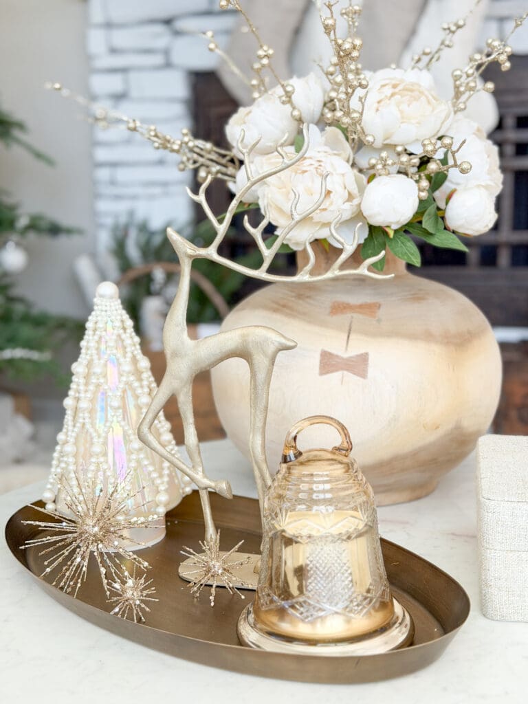 A stylish and classic Christmas home tour | How to decorate your home for the holidays using some sparkly decor plus traditional red decor in some spaces | Silver and gold Christmas decor | Red plaid bedroom decor | How to decorate your kitchen for Christmas | What to do with your European Christmas market mugs