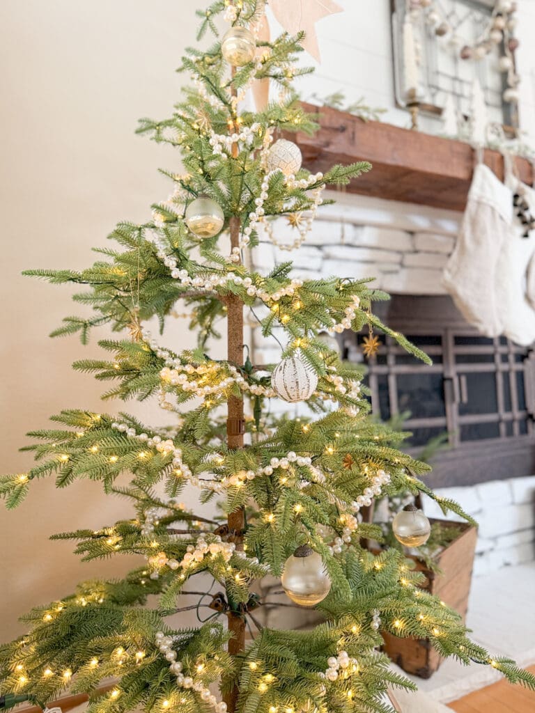 A stylish and classic Christmas home tour | How to decorate your home for the holidays using some sparkly decor plus traditional red decor in some spaces | Silver and gold Christmas decor | Red plaid bedroom decor | How to decorate your kitchen for Christmas | What to do with your European Christmas market mugs