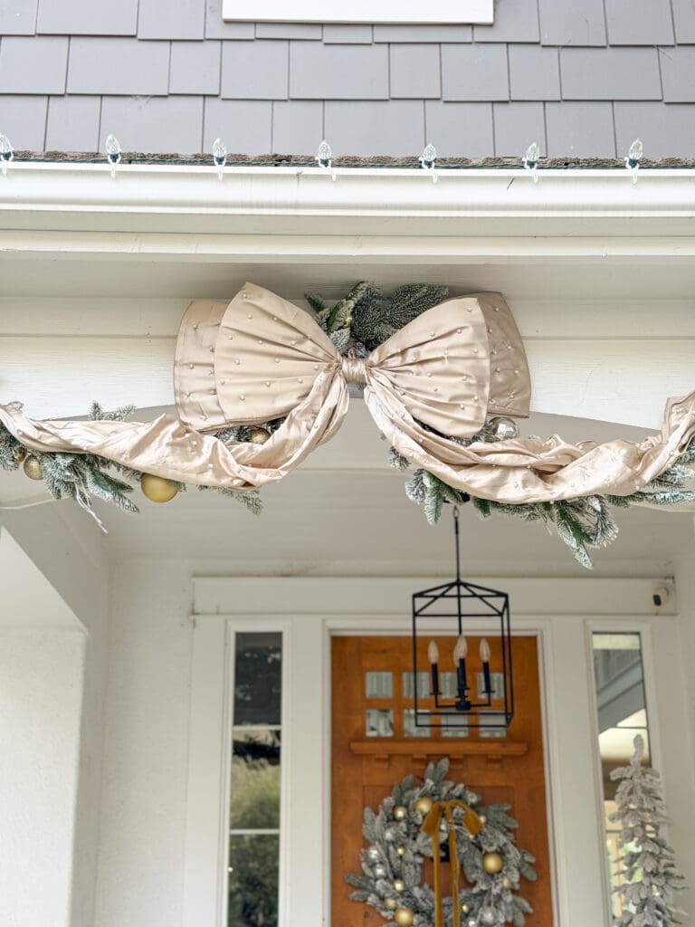 A stylish and classic Christmas home tour | How to decorate your home for the holidays using some sparkly decor plus traditional red decor in some spaces | Silver and gold Christmas decor | Red plaid bedroom decor | How to decorate your front porch for Christmas