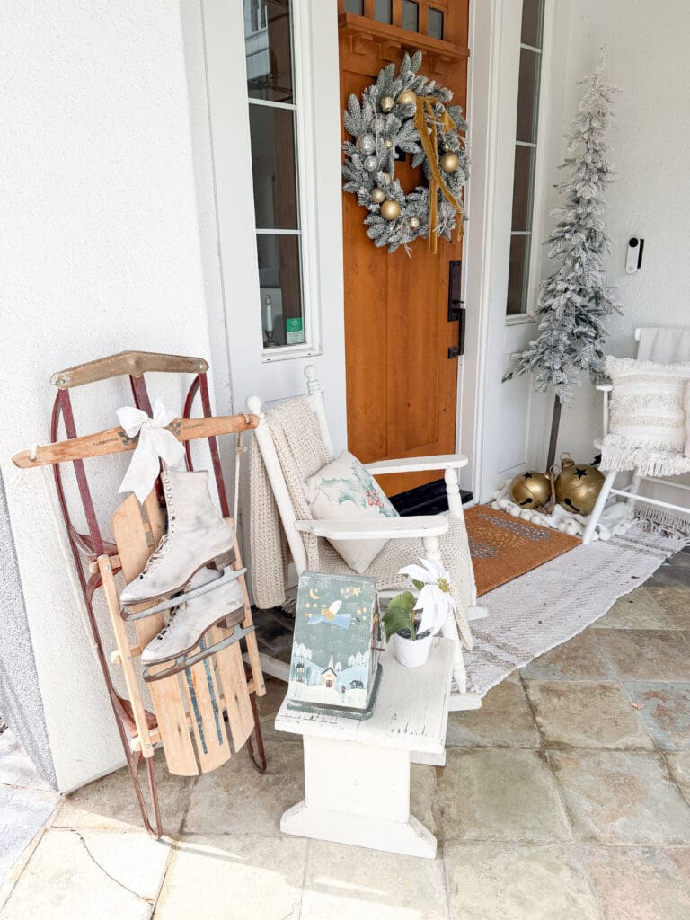 A stylish and classic Christmas home tour | How to decorate your home for the holidays using some sparkly decor plus traditional red decor in some spaces | Silver and gold Christmas decor | Red plaid bedroom decor | How to decorate your front porch for Christmas