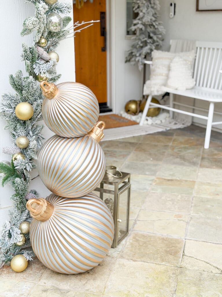 A stylish and classic Christmas home tour | How to decorate your home for the holidays using some sparkly decor plus traditional red decor in some spaces | Silver and gold Christmas decor | Red plaid bedroom decor | How to decorate your front porch for Christmas