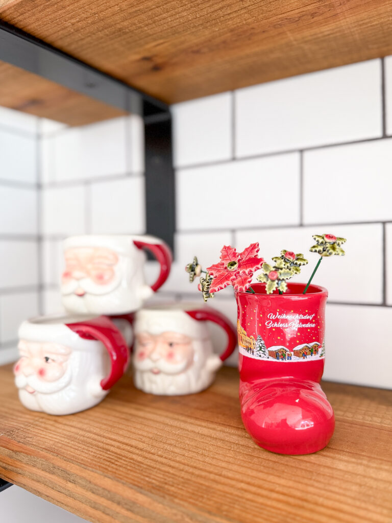 A stylish and classic Christmas home tour | How to decorate your home for the holidays using some sparkly decor plus traditional red decor in some spaces | Silver and gold Christmas decor | Red plaid bedroom decor | How to decorate your kitchen for Christmas | What to do with your European Christmas market mugs