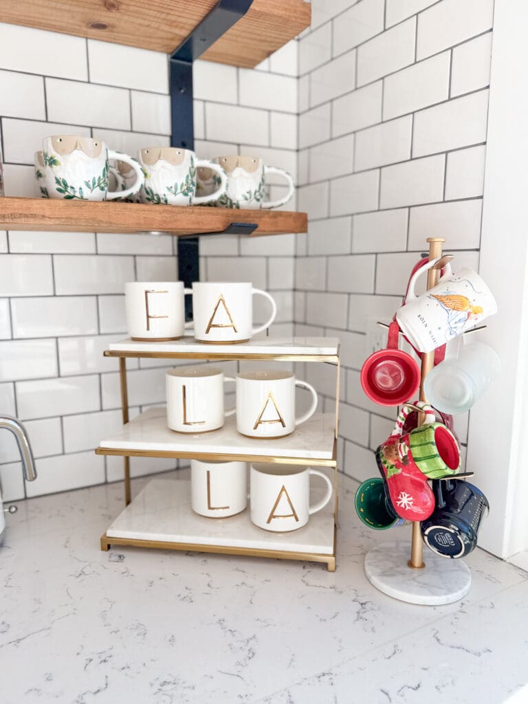 A stylish and classic Christmas home tour | How to decorate your home for the holidays using some sparkly decor plus traditional red decor in some spaces | Silver and gold Christmas decor | Red plaid bedroom decor | How to decorate your kitchen for Christmas | What to do with your European Christmas market mugs