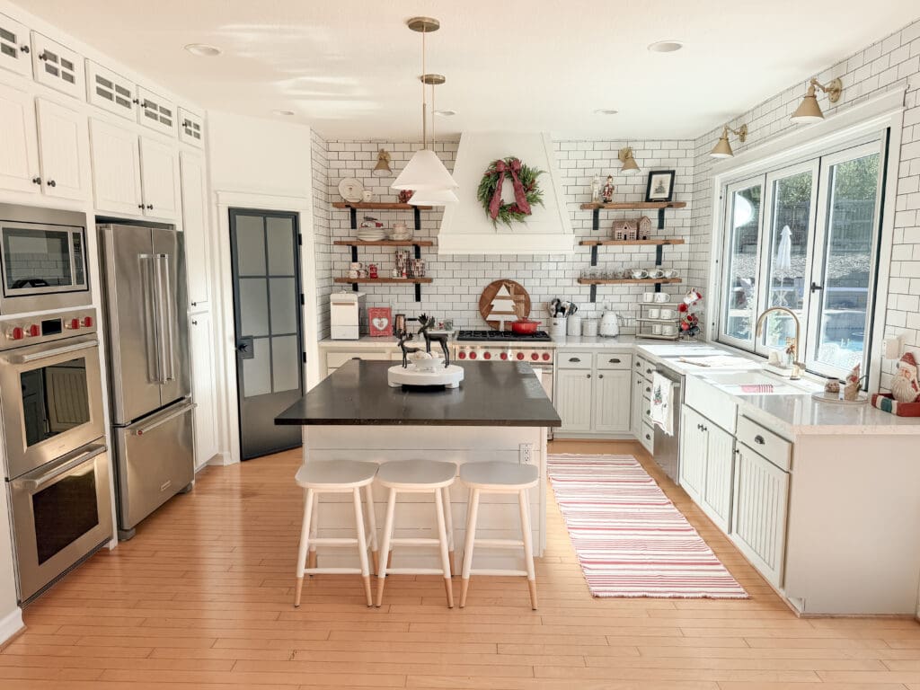 A stylish and classic Christmas home tour | How to decorate your home for the holidays using some sparkly decor plus traditional red decor in some spaces | Silver and gold Christmas decor | Red plaid bedroom decor | How to decorate your kitchen for Christmas