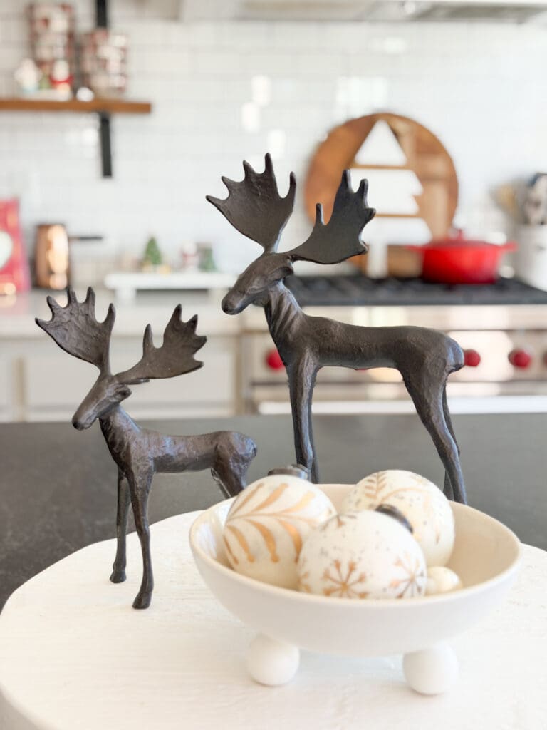 A stylish and classic Christmas home tour | How to decorate your home for the holidays using some sparkly decor plus traditional red decor in some spaces | Silver and gold Christmas decor | Red plaid bedroom decor | How to decorate your kitchen for Christmas