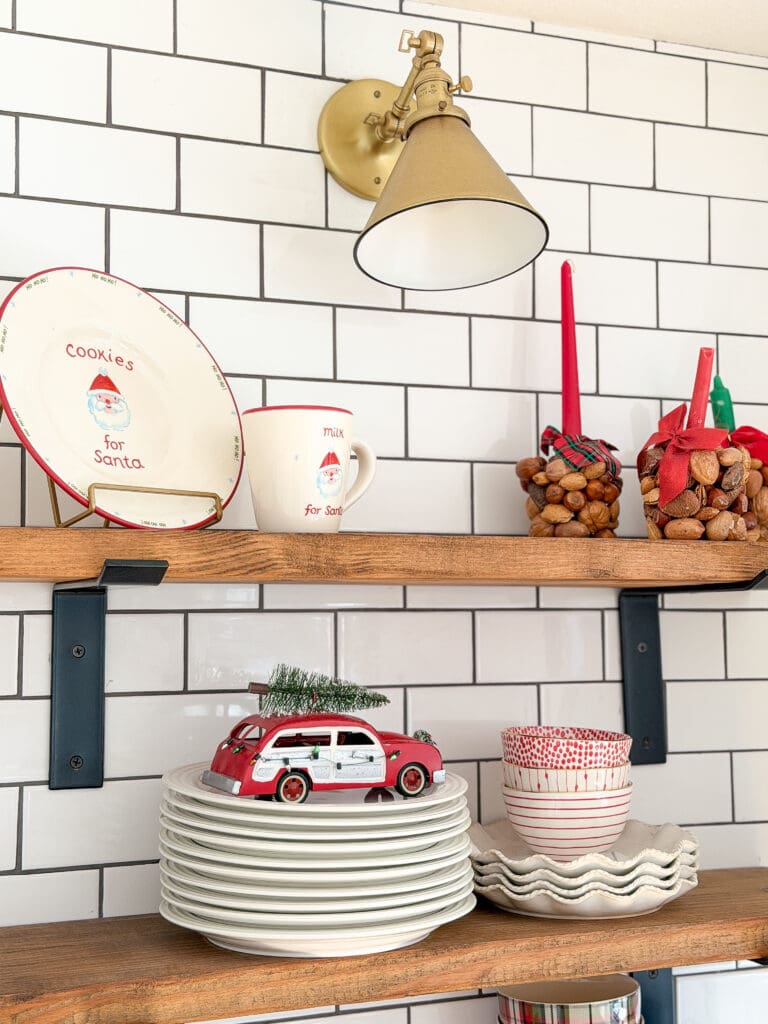 A stylish and classic Christmas home tour | How to decorate your home for the holidays using some sparkly decor plus traditional red decor in some spaces | Silver and gold Christmas decor | Red plaid bedroom decor | How to decorate your kitchen for Christmas