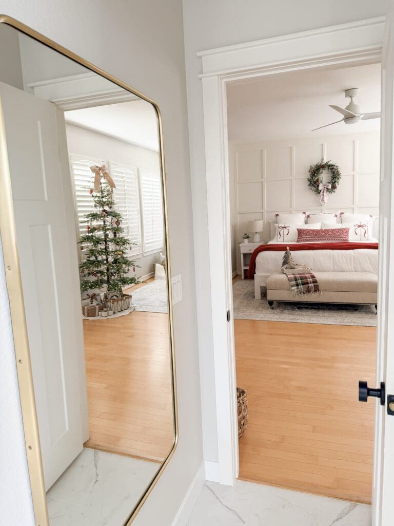 A stylish and classic Christmas home tour | How to decorate your home for the holidays using some sparkly decor plus traditional red decor in some spaces | Silver and gold Christmas decor | Red plaid bedroom decor | How to decorate your kitchen for Christmas | What to do with your European Christmas market mugs