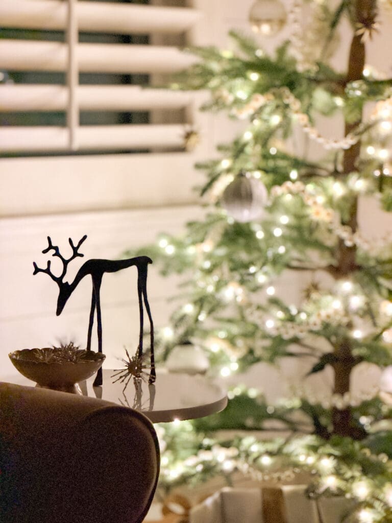 A stylish and classic Christmas home tour | How to decorate your home for the holidays using some sparkly decor plus traditional red decor in some spaces | Silver and gold Christmas decor | Red plaid bedroom decor | How to decorate your kitchen for Christmas | What to do with your European Christmas market mugs