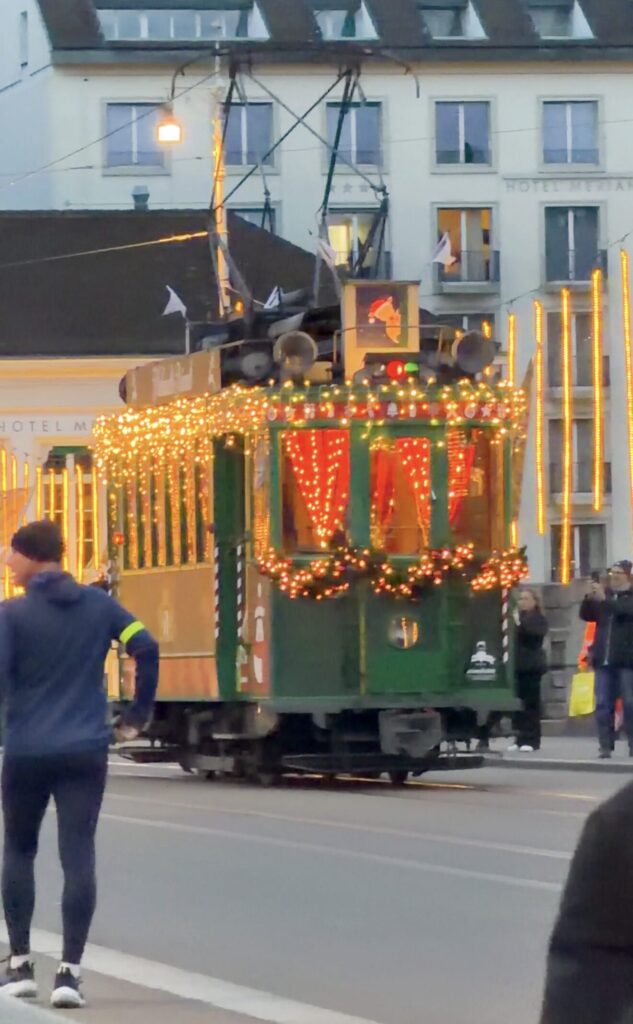 Basel Switzerland at Christmas TIme - A Complete Guide | Why I will always take a European Christmas Market trip every year | Top European Christmas Market to avoid massive crowds | Best Christmas Markets in Switzerland | Reasons to book a Flytographer photo shoot in Europe at Christmas time | Best five star hotels in Basel Switzerland | Top things to see and do in Basel at Christmas time | What to wear to the Basel Christmas market | How many days to spend in Basel for Christmas market trip | Where to find the Magical Christmas Courtyards in Basel | Visiting Basel Minster and what you need to know before climbing the tower | Visiting the Christmas Market in Basel | Reviews of Grand Hotel Les Trois Rois in Basel 