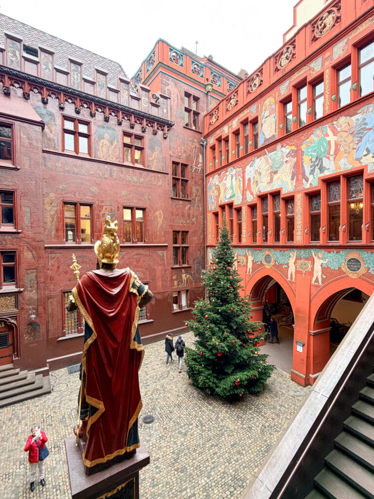 Basel Switzerland at Christmas TIme - A Complete Guide | Why I will always take a European Christmas Market trip every year | Top European Christmas Market to avoid massive crowds | Best Christmas Markets in Switzerland | Reasons to book a Flytographer photo shoot in Europe at Christmas time | Best five star hotels in Basel Switzerland | Top things to see and do in Basel at Christmas time | What to wear to the Basel Christmas market | How many days to spend in Basel for Christmas market trip | Where to find the Magical Christmas Courtyards in Basel 