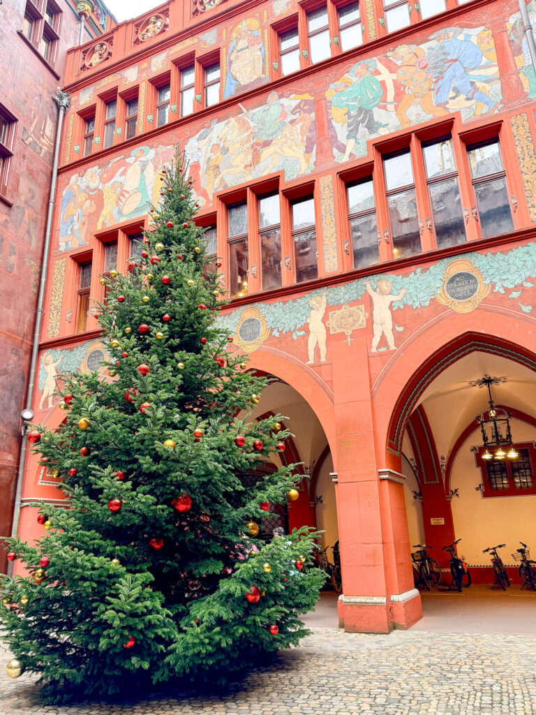 Basel Switzerland at Christmas TIme - A Complete Guide | Why I will always take a European Christmas Market trip every year | Top European Christmas Market to avoid massive crowds | Best Christmas Markets in Switzerland | Reasons to book a Flytographer photo shoot in Europe at Christmas time | Best five star hotels in Basel Switzerland | Top things to see and do in Basel at Christmas time | What to wear to the Basel Christmas market | How many days to spend in Basel for Christmas market trip | Where to find the Magical Christmas Courtyards in Basel 