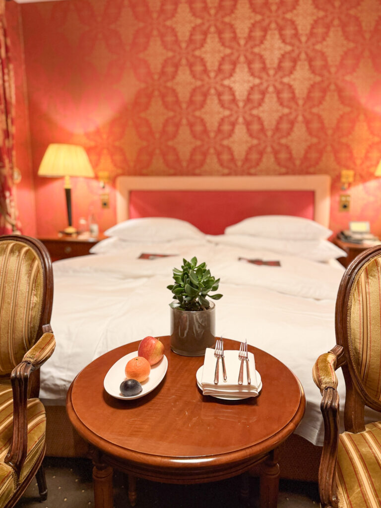 Basel Switzerland at Christmas TIme - A Complete Guide | Why I will always take a European Christmas Market trip every year | Top European Christmas Market to avoid massive crowds | Best Christmas Markets in Switzerland | Reasons to book a Flytographer photo shoot in Europe at Christmas time | Best five star hotels in Basel Switzerland | Top things to see and do in Basel at Christmas time | What to wear to the Basel Christmas market | How many days to spend in Basel for Christmas market trip | Where to find the Magical Christmas Courtyards in Basel | Visiting Basel Minster and what you need to know before climbing the tower | Visiting the Christmas Market in Basel | Reviews of Grand Hotel Les Trois Rois in Basel 