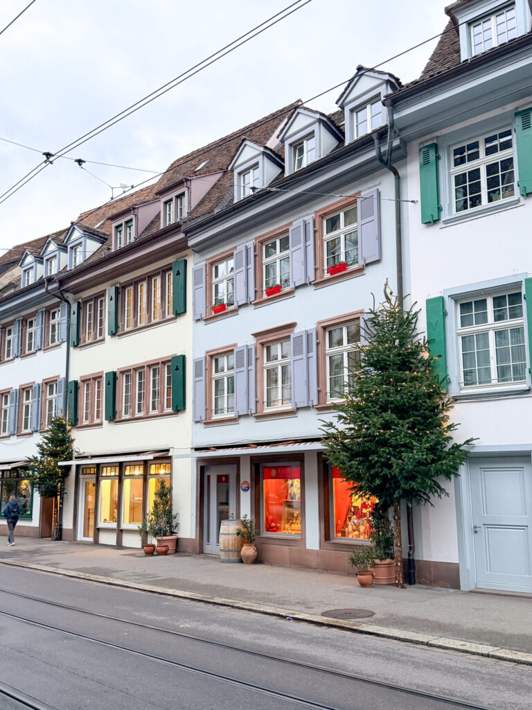 Basel Switzerland at Christmas TIme - A Complete Guide | Why I will always take a European Christmas Market trip every year | Top European Christmas Market to avoid massive crowds | Best Christmas Markets in Switzerland | Reasons to book a Flytographer photo shoot in Europe at Christmas time | Best five star hotels in Basel Switzerland | Top things to see and do in Basel at Christmas time | What to wear to the Basel Christmas market | How many days to spend in Basel for Christmas market trip | Where to find the Magical Christmas Courtyards in Basel 