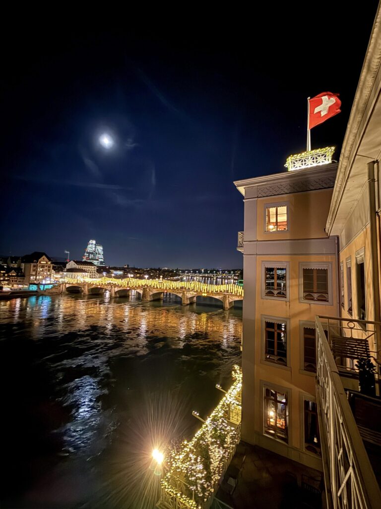 Basel Switzerland at Christmas TIme - A Complete Guide | Why I will always take a European Christmas Market trip every year | Top European Christmas Market to avoid massive crowds | Best Christmas Markets in Switzerland | Reasons to book a Flytographer photo shoot in Europe at Christmas time | Best five star hotels in Basel Switzerland | Top things to see and do in Basel at Christmas time | What to wear to the Basel Christmas market | How many days to spend in Basel for Christmas market trip | Where to find the Magical Christmas Courtyards in Basel | Visiting Basel Minster and what you need to know before climbing the tower | Visiting the Christmas Market in Basel | Reviews of Grand Hotel Les Trois Rois in Basel 