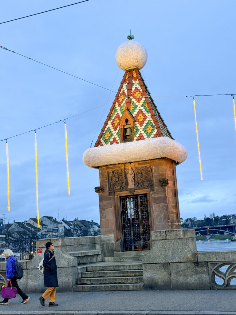 Basel Switzerland at Christmas TIme - A Complete Guide | Why I will always take a European Christmas Market trip every year | Top European Christmas Market to avoid massive crowds | Best Christmas Markets in Switzerland | Reasons to book a Flytographer photo shoot in Europe at Christmas time | Best five star hotels in Basel Switzerland | Top things to see and do in Basel at Christmas time | What to wear to the Basel Christmas market | How many days to spend in Basel for Christmas market trip | Where to find the Magical Christmas Courtyards in Basel 