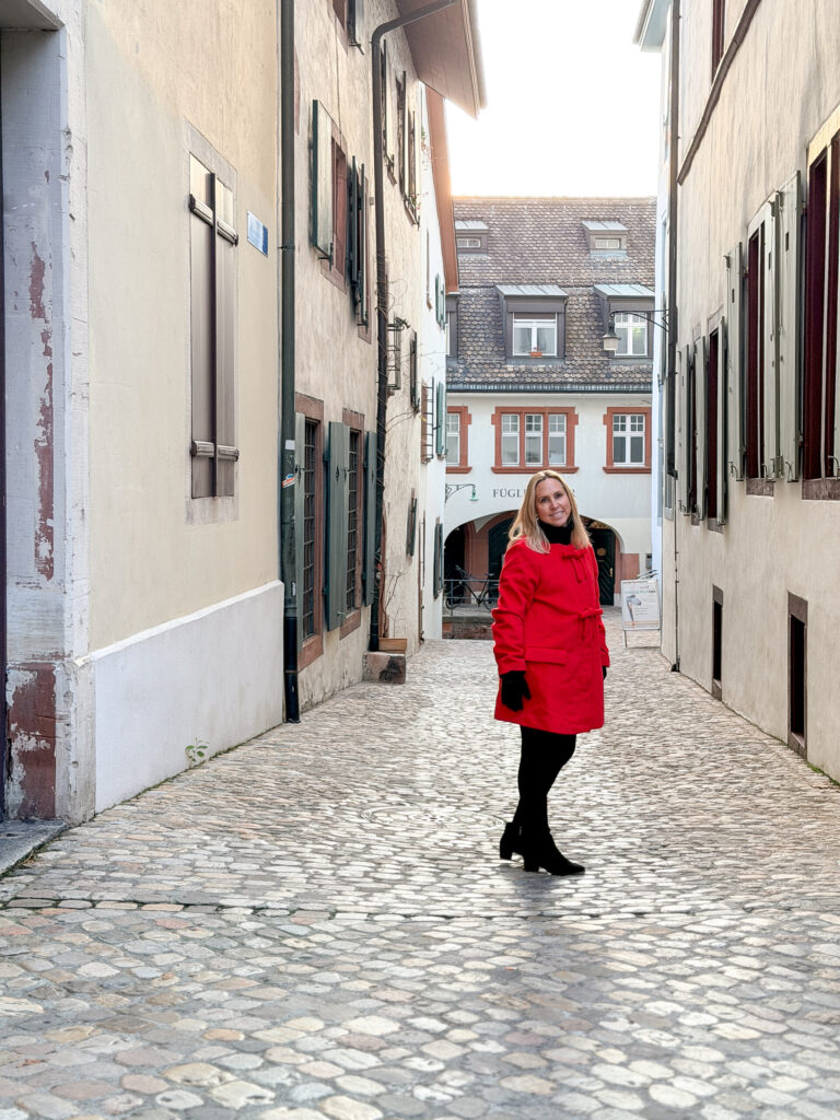 Basel Switzerland at Christmas TIme - A Complete Guide | Why I will always take a European Christmas Market trip every year | Top European Christmas Market to avoid massive crowds | Best Christmas Markets in Switzerland | Reasons to book a Flytographer photo shoot in Europe at Christmas time | Best five star hotels in Basel Switzerland | Top things to see and do in Basel at Christmas time | What to wear to the Basel Christmas market | How many days to spend in Basel for Christmas market trip | Where to find the Magical Christmas Courtyards in Basel | Visiting Basel Minster and what you need to know before climbing the tower 