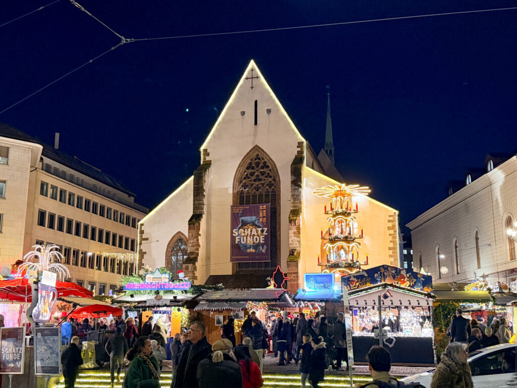 Basel Switzerland at Christmas TIme - A Complete Guide | Why I will always take a European Christmas Market trip every year | Top European Christmas Market to avoid massive crowds | Best Christmas Markets in Switzerland | Reasons to book a Flytographer photo shoot in Europe at Christmas time | Best five star hotels in Basel Switzerland | Top things to see and do in Basel at Christmas time | What to wear to the Basel Christmas market | How many days to spend in Basel for Christmas market trip | Where to find the Magical Christmas Courtyards in Basel | Visiting Basel Minster and what you need to know before climbing the tower | Visiting the Christmas Market in Basel 