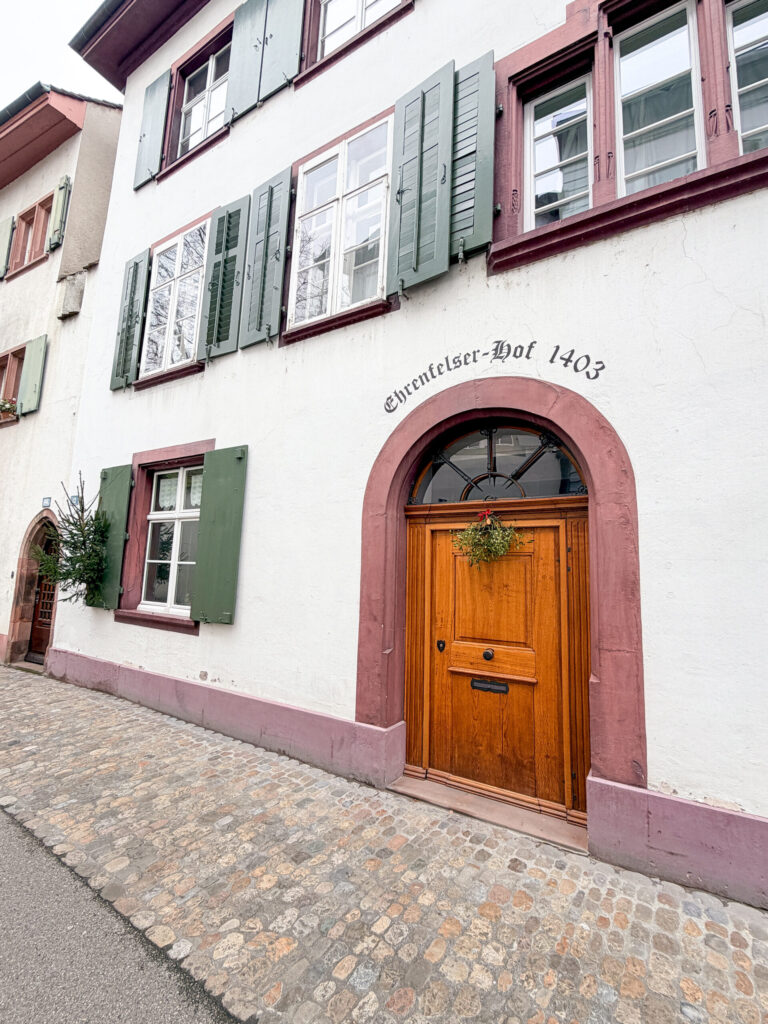 Basel Switzerland at Christmas TIme - A Complete Guide | Why I will always take a European Christmas Market trip every year | Top European Christmas Market to avoid massive crowds | Best Christmas Markets in Switzerland | Reasons to book a Flytographer photo shoot in Europe at Christmas time | Best five star hotels in Basel Switzerland | Top things to see and do in Basel at Christmas time | What to wear to the Basel Christmas market | How many days to spend in Basel for Christmas market trip | Where to find the Magical Christmas Courtyards in Basel | Visiting Basel Minster and what you need to know before climbing the tower 