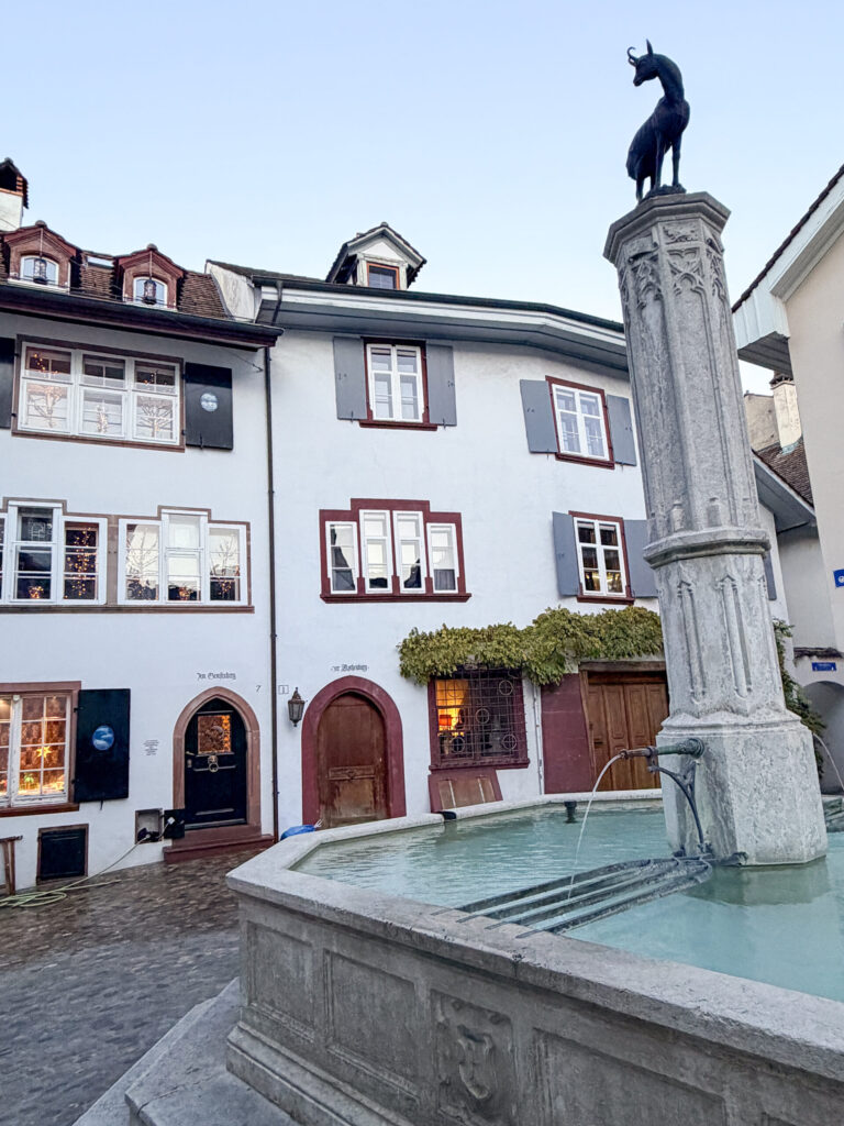 Basel Switzerland at Christmas TIme - A Complete Guide | Why I will always take a European Christmas Market trip every year | Top European Christmas Market to avoid massive crowds | Best Christmas Markets in Switzerland | Reasons to book a Flytographer photo shoot in Europe at Christmas time | Best five star hotels in Basel Switzerland | Top things to see and do in Basel at Christmas time | What to wear to the Basel Christmas market | How many days to spend in Basel for Christmas market trip | Where to find the Magical Christmas Courtyards in Basel 