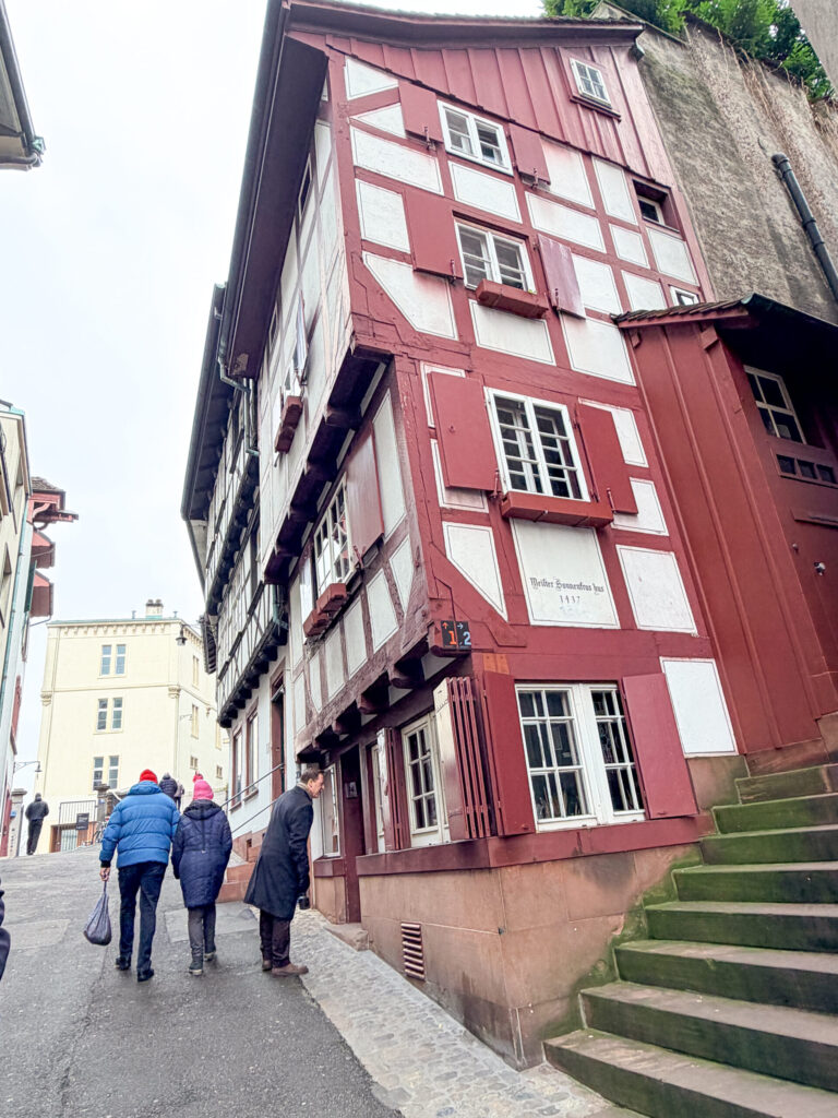 Basel Switzerland at Christmas TIme - A Complete Guide | Why I will always take a European Christmas Market trip every year | Top European Christmas Market to avoid massive crowds | Best Christmas Markets in Switzerland | Reasons to book a Flytographer photo shoot in Europe at Christmas time | Best five star hotels in Basel Switzerland | Top things to see and do in Basel at Christmas time | What to wear to the Basel Christmas market | How many days to spend in Basel for Christmas market trip | Where to find the Magical Christmas Courtyards in Basel | Visiting Basel Minster and what you need to know before climbing the tower 