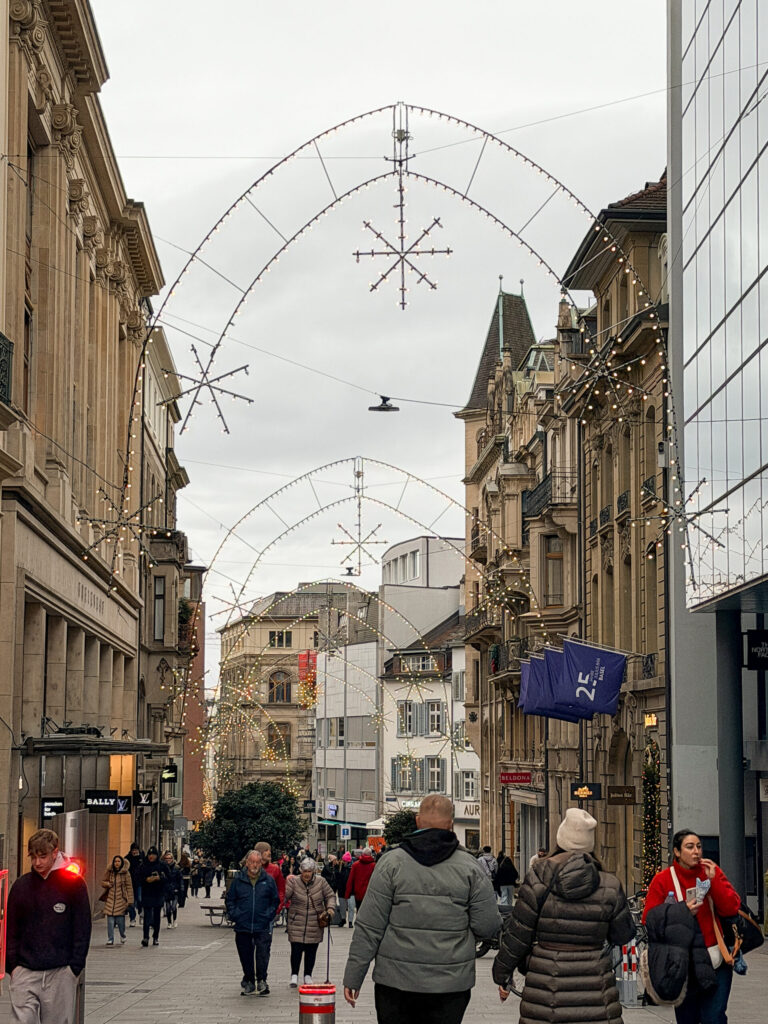 Basel Switzerland at Christmas TIme - A Complete Guide | Why I will always take a European Christmas Market trip every year | Top European Christmas Market to avoid massive crowds | Best Christmas Markets in Switzerland | Reasons to book a Flytographer photo shoot in Europe at Christmas time | Best five star hotels in Basel Switzerland | Top things to see and do in Basel at Christmas time | What to wear to the Basel Christmas market | How many days to spend in Basel for Christmas market trip | Where to find the Magical Christmas Courtyards in Basel 