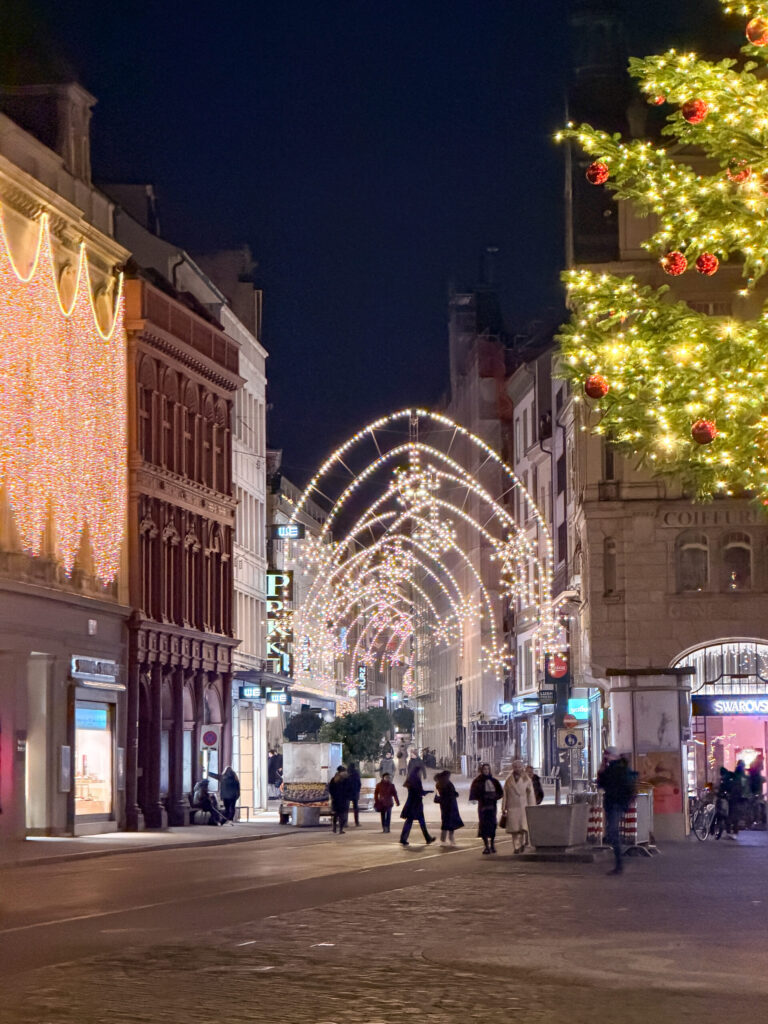 Basel Switzerland at Christmas TIme - A Complete Guide | Why I will always take a European Christmas Market trip every year | Top European Christmas Market to avoid massive crowds | Best Christmas Markets in Switzerland | Reasons to book a Flytographer photo shoot in Europe at Christmas time | Best five star hotels in Basel Switzerland | Top things to see and do in Basel at Christmas time | What to wear to the Basel Christmas market | How many days to spend in Basel for Christmas market trip | Where to find the Magical Christmas Courtyards in Basel 