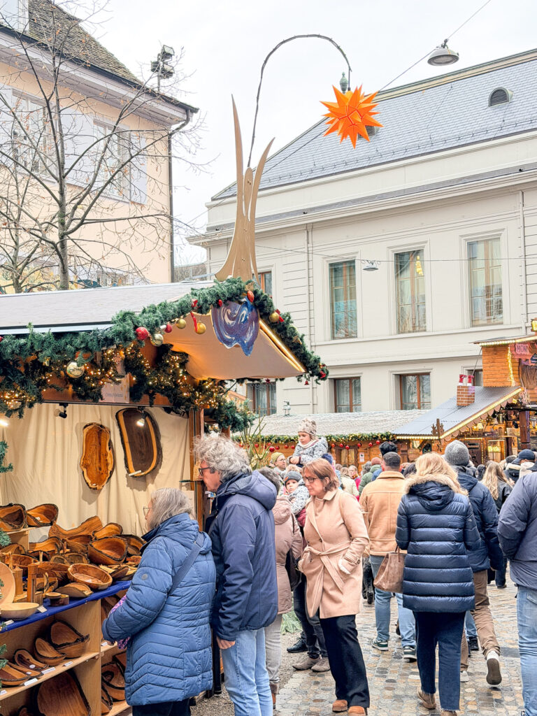 Basel Switzerland at Christmas TIme - A Complete Guide | Why I will always take a European Christmas Market trip every year | Top European Christmas Market to avoid massive crowds | Best Christmas Markets in Switzerland | Reasons to book a Flytographer photo shoot in Europe at Christmas time | Best five star hotels in Basel Switzerland | Top things to see and do in Basel at Christmas time | What to wear to the Basel Christmas market | How many days to spend in Basel for Christmas market trip | Where to find the Magical Christmas Courtyards in Basel | Visiting Basel Minster and what you need to know before climbing the tower | Visiting the Christmas Market in Basel 